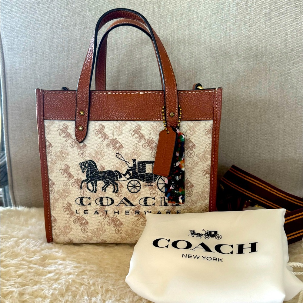 Coach Field Tote 22 with Horse and Carriage print.
